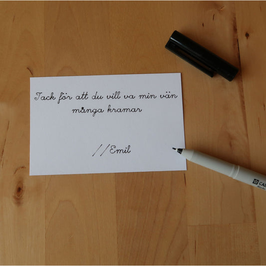 Hälsning skriven med penna